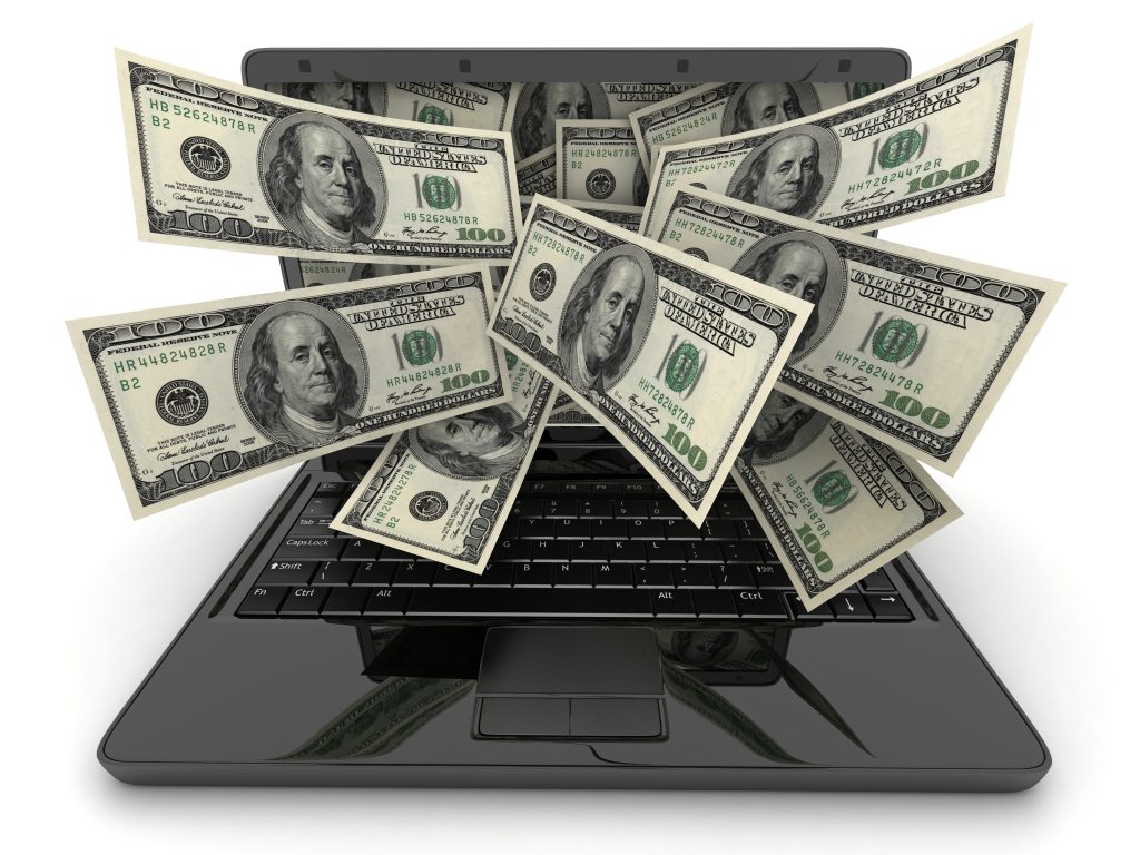 15390102 - black laptop and money