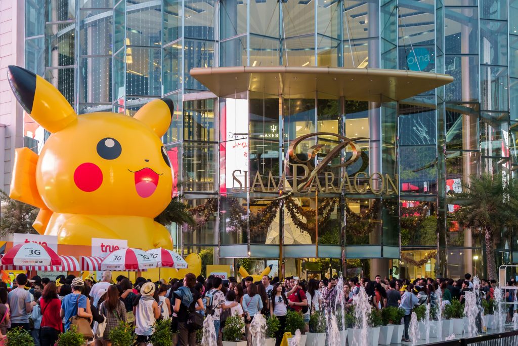 Bangkok - Jan. 11: Shoppers visit Siam Paragon mall and Pokemon Festival in the Siam Square area on Jan. 11, 2015 in Bangkok, Thailand. With 300,000 sq m of retail space Siam Paragon is one of the world's largest malls.