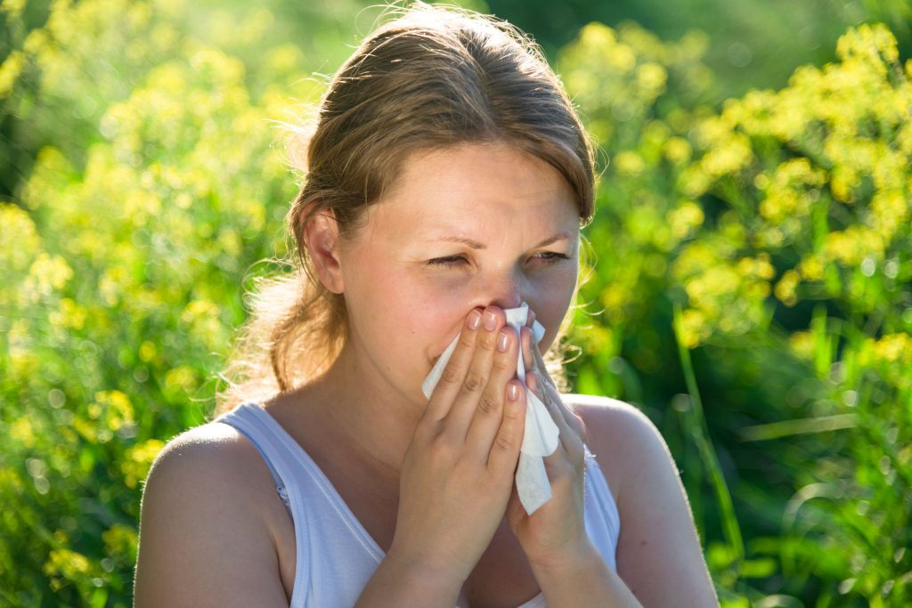 28642620 - woman suffering from pollen allergy
