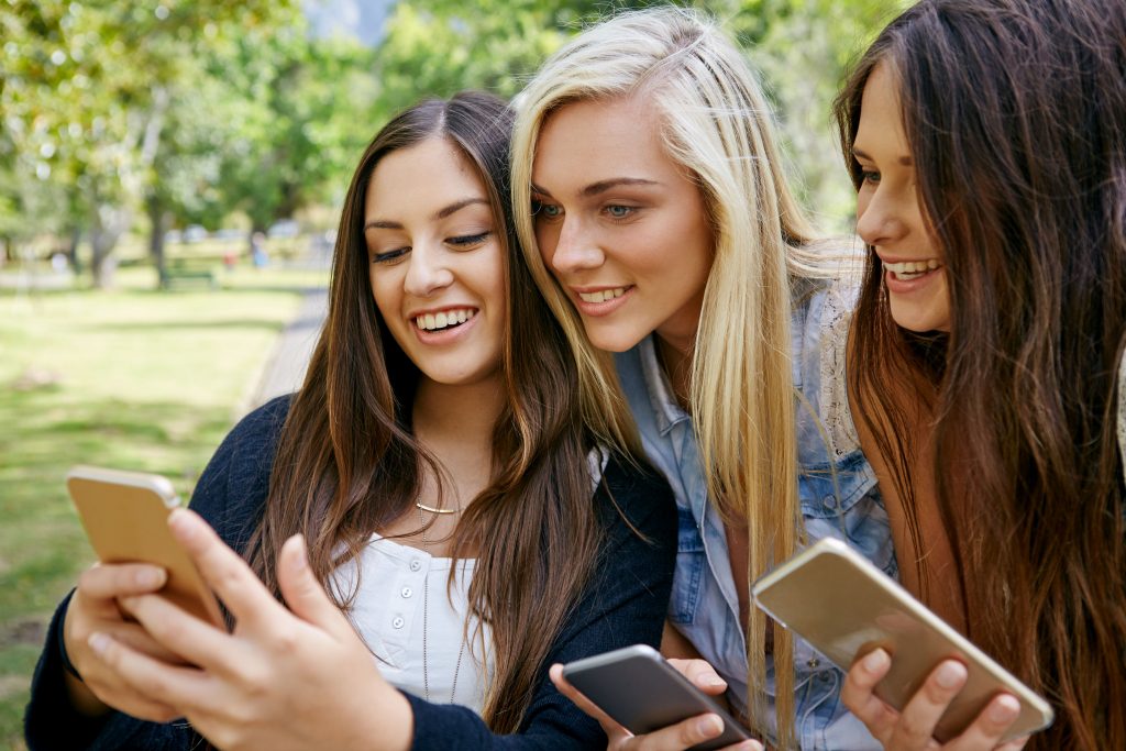 millenials  teenagers teens girls friends phones social media networking  networks youth generation y