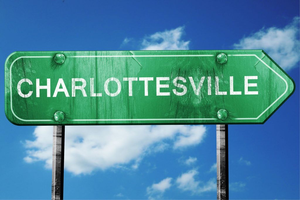 55168304 - charlottesville road sign on a blue sky background