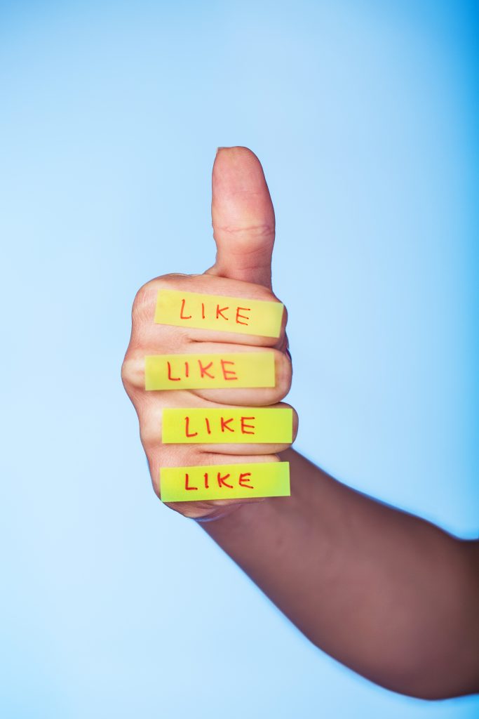 Like Facebook engagement impressions Social media thumbs up